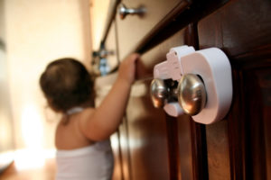 Child-proof locks on a cabinet