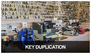 Image of a wall of key blanks and key cutters in the Keyway locksmith shop